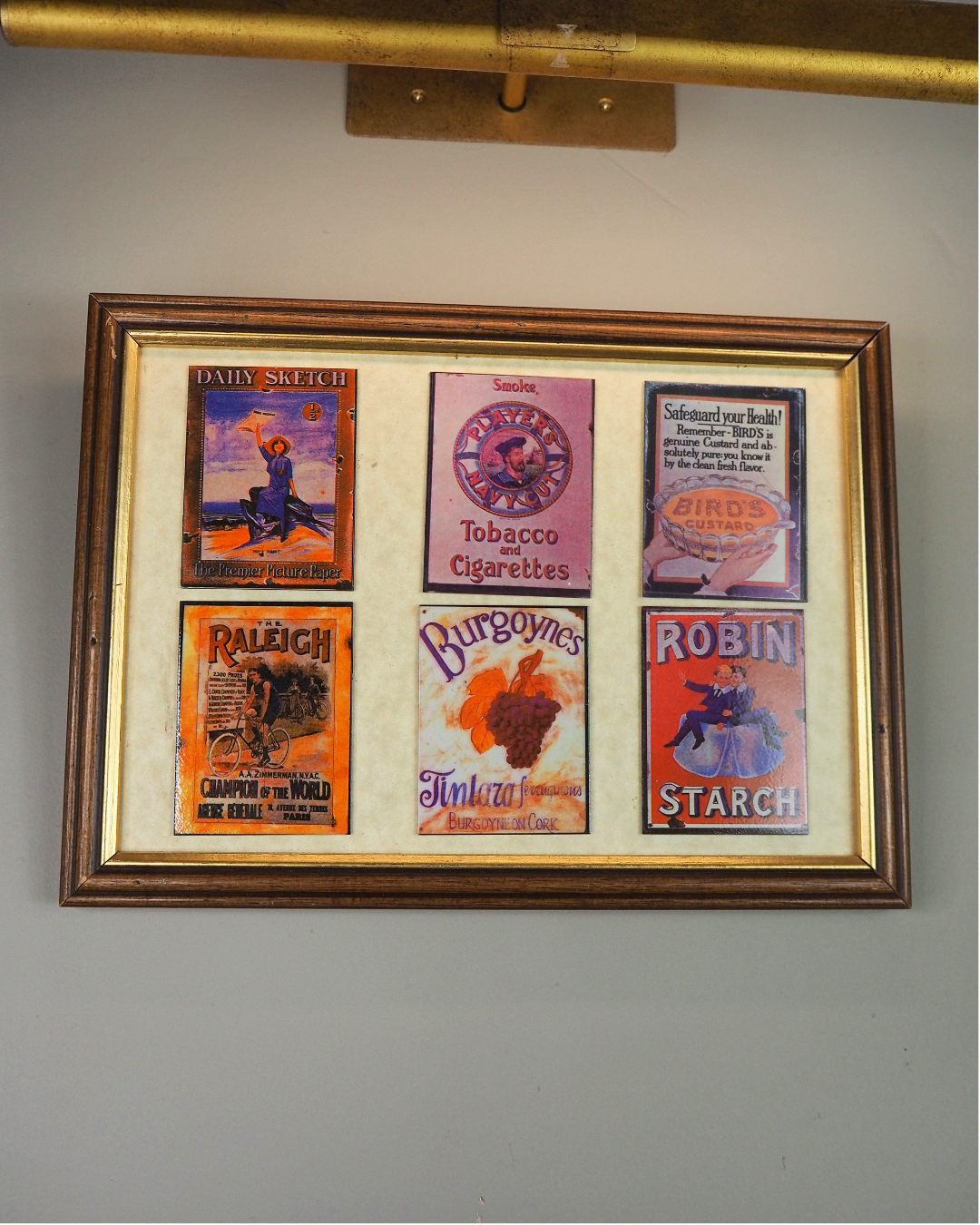Enamel Echoes – Unique Antique Steel Advertising Signs on Wooden Frame