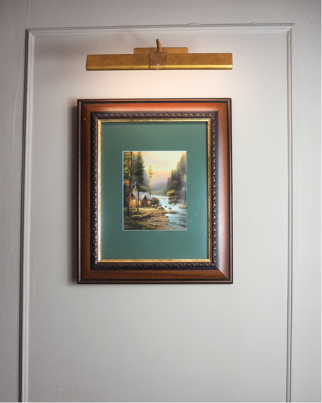 Thomas Kinkade –  Evening in the forest '95 Framed Print