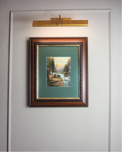 Thomas Kinkade –  Evening in the forest '95 Framed Print