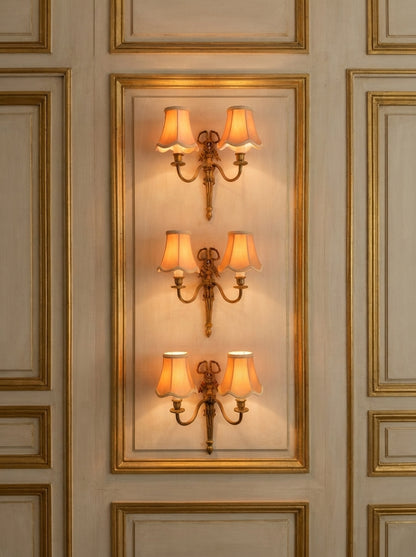 Early 20th Century Louis XVI–Style Brass Two-Arm Wall Light with Ribbon Detail