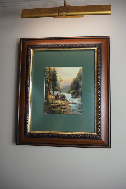 Thomas Kinkade –  Evening in the forest '95 Framed Print